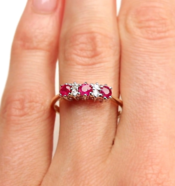 Ruby 0.58ct And Diamond 9K Gold Ring